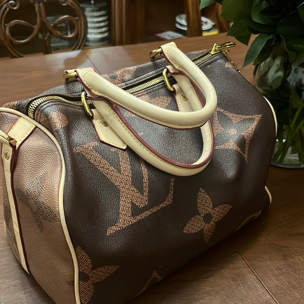 Leather satchel bag . 12 by 10 inches
